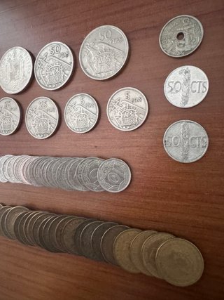 Lote 56 monedas España Franco: incluye 25 pts. *58