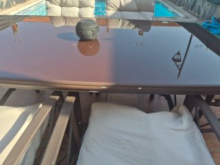 Mesa de patio con 6 sillones