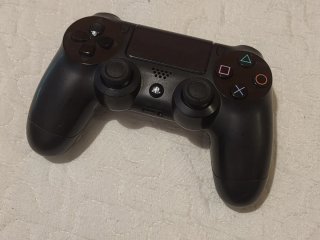 PS4 Pro 1TB + mando + 5 Juegos