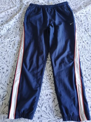 Pantalón de chándal Nike azul y rojo