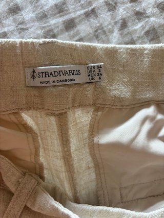 Pantalón ancho tipo lino beige