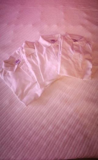 Lote 4 polos blancos talla 9 años