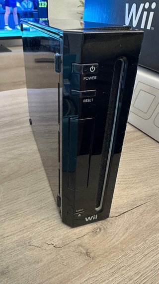 Nintendo Wii Negra + Wii Sports + Resort Pak