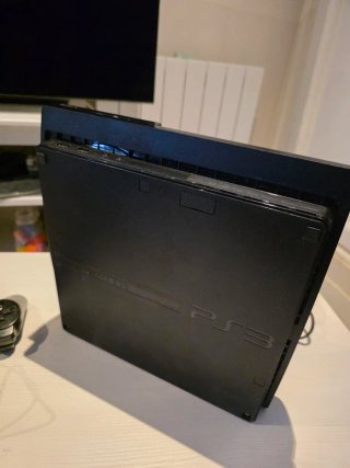Consola PS3 Slim Negra + Juegos y Accesorios