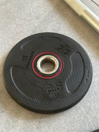 Barra de pesas de con discos y cierres