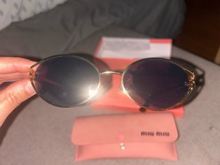 Gafas de sol Miu Miu doradas y marrones