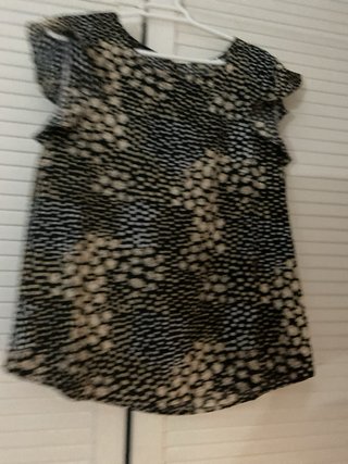 Blusa estampada beige y negra