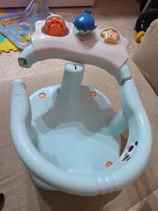 Asiento de baño para bebé con juguetes