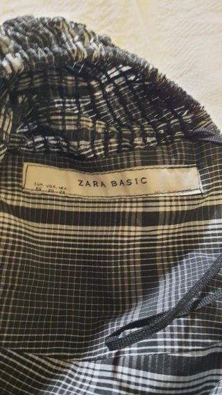 Camiseta a cuadros sin mangas