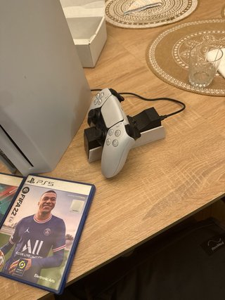 Consola PS5 + 2 Juegos mas cargador de mandos