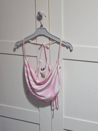 Top rosa y blanco con estampado cebra