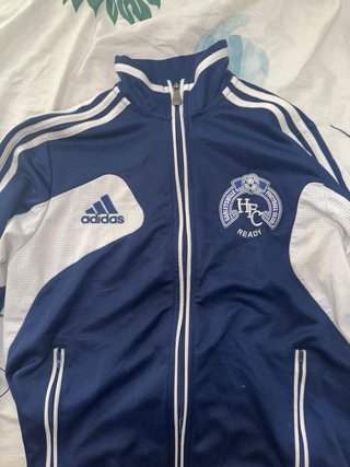 Chaqueta deportiva Adidas azul y blanca