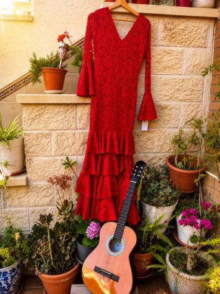 Traje de flamenca rojo con volantes