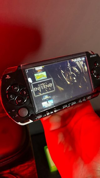 PSP 1004 128GB + custodia + auricolari + caricatore...