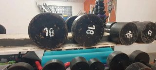 Juego de mancuernas con 260kg +rack