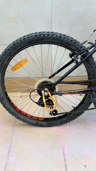 Bicicleta Rockrider BTWIN 24 Negra/naranja