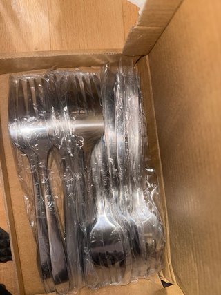 Set de cubiertos de metal plateado