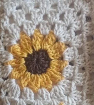 Funda de ganchillo para libros con girasoles