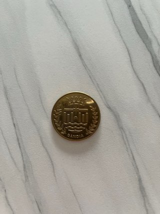 Monedas con escudo y corona