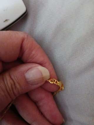 Colgante Cruz Esmeraldas y Pulsera a juego.
