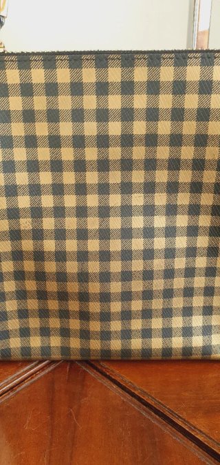 Pochette oro e nero a quadretti