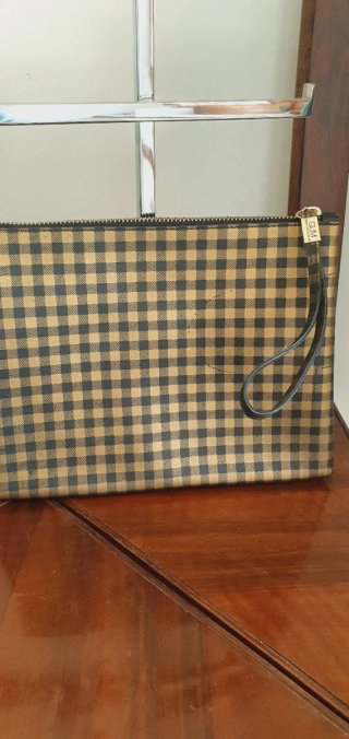 Pochette oro e nero a quadretti