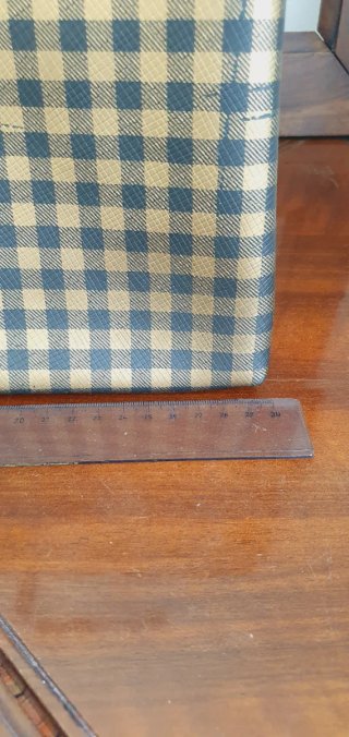 Pochette oro e nero a quadretti