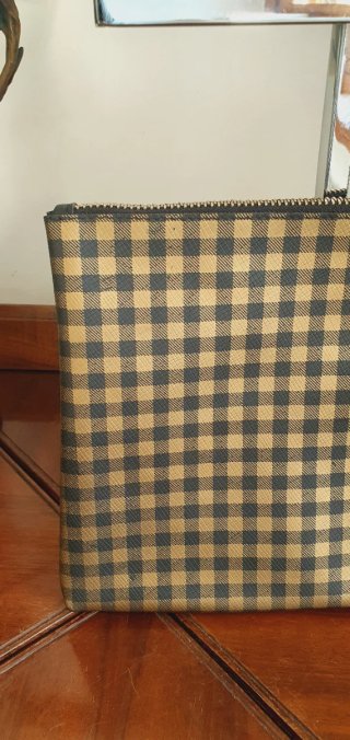 Pochette oro e nero a quadretti