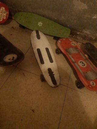 Patineta verde y blanca