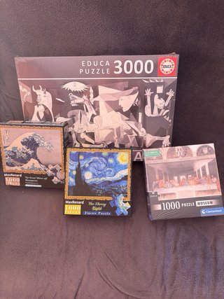 4 Puzzles con un total de 6000 piezas.