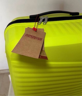 Maleta mediana American Tourister amarilla