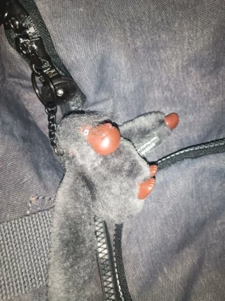 Maleta Kipling gris tipo mochila