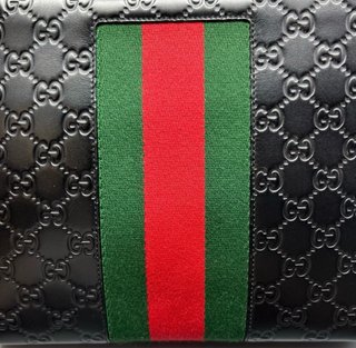 Bolso Neceser Gucci GG Interlocking Supreme Web
