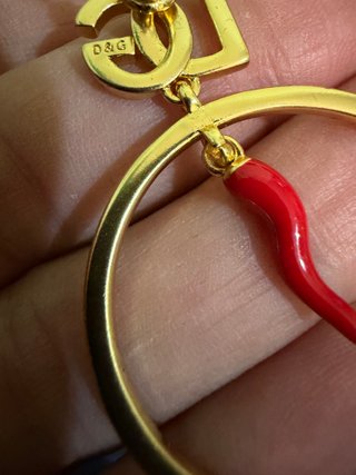 Orecchini Dolce & Gabbana DG corno rosso oro