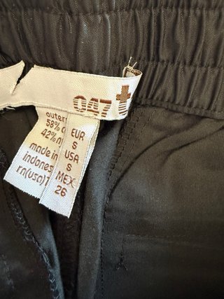 Pantalón corto negro con rayas