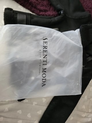 Chaqueta efecto piel vuelta negra