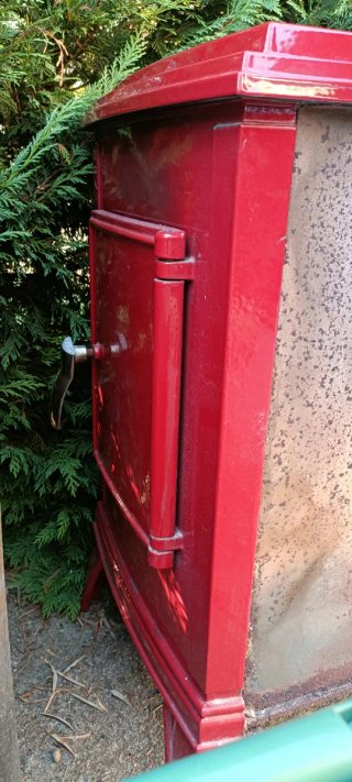Estufa de leña Invicta Roja