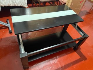 Mesa de centro elevable de color negro y blanco