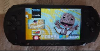 PSP+Cargador+Tarjeta con juegos+2 juegos fisicos