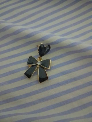 Pendientes lazo negro y dorado