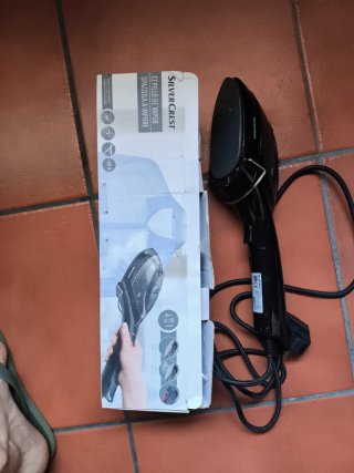 Cepillo de vapor para ropa