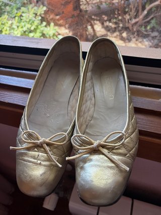 Zapatos planos dorados El Corte Inglés T.39