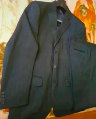 Traje de chaqueta gris chico Talla XL