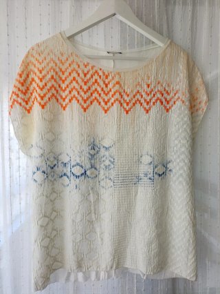 Top Zara estampado zigzag naranja y blanco