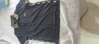 Polo Boss Negro y Dorado