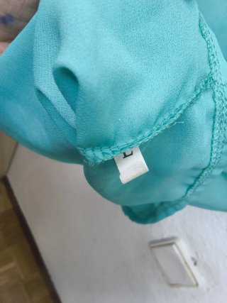 Vestido sin mangas color turquesa