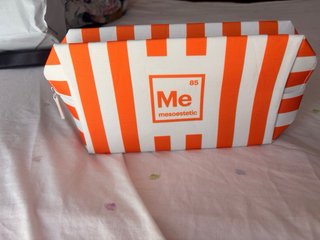 Neceser Mesoestetic Naranja y Blanco
