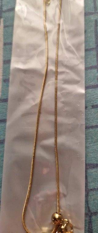 Collana con orsetto e campanella dorata