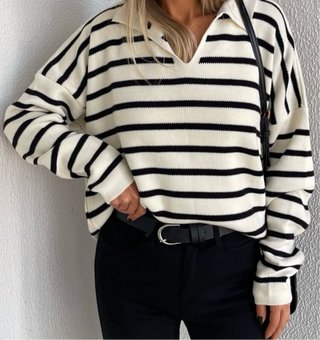 Jersey rayas blanco y negro cuello polo