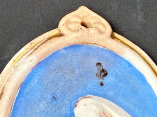 Benditera de porcelana